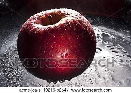 Stock Photo - Studio shot of red apple. Fotosearch