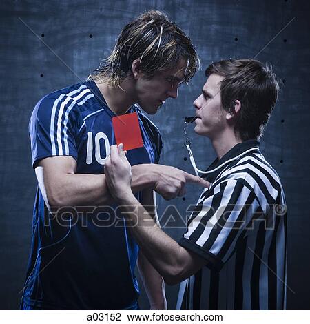Studio shot of referee showing red card View Large Photo Image Stock Image - Studio shot of referee showing red card. Fotosearch