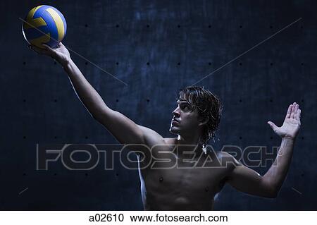 Studio shot of volleyball player playing View Large Photo Image Stock Image - Studio shot of volleyball player playing. Fotosearch