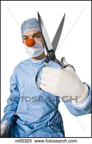 Stock Photography - surgeon wearing a creepy clown nose and holding scissors. Fotosearch