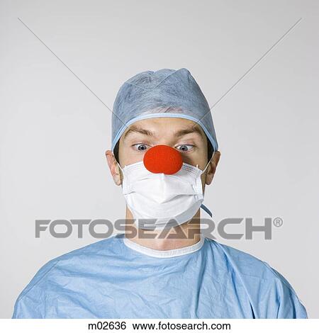 surgeon wearing a red clown nose View Large Photo Image Stock Photograph - surgeon wearing a red clown nose. Fotosearch