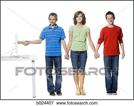 teenagers holding hands with a hand coming out of a computer View Large Photo Image Stock Photo - teenagers holding hands with a hand coming out of a computer. Fotosearch