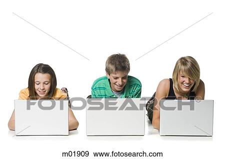 teenagers using computer View Large Photo Image Stock Photo - teenagers using computer. Fotosearch