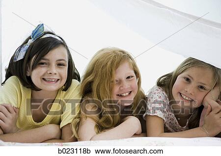 three girls in a bedroom View Large Photo Image Stock Image - three girls in a bedroom. Fotosearch