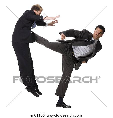 Stock Photography - two businessmen fighting. Fotosearch