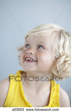 Stock Image - USA, California, San Francisco, portrait of smiling girl (2-3). Fotosearch