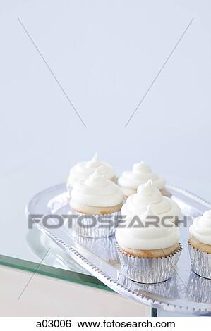 USA, California, San Francisco, cupcakes with frosting on silver plate View Large Photo Image Stock Photograph - USA, California, San Francisco, cupcakes with frosting on silver plate. Fotosearch