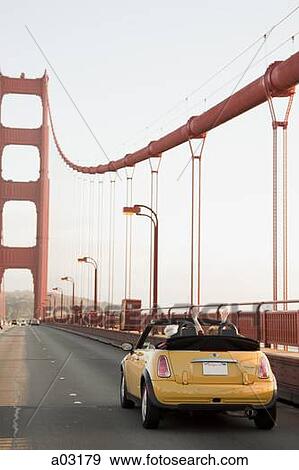 USA, California, San Francisco, yellow car on Golden Gate Bridge View Large Photo Image Stock Photo - USA, California, San Francisco, yellow car on Golden Gate Bridge. Fotosearch