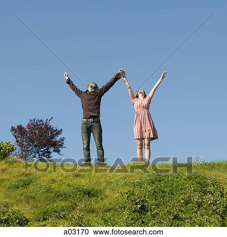 USA, California, San Francisco, young couple holding hands on hill View Large Photo Image Stock Image - USA, California, San Francisco, young couple holding hands on hill. Fotosearch