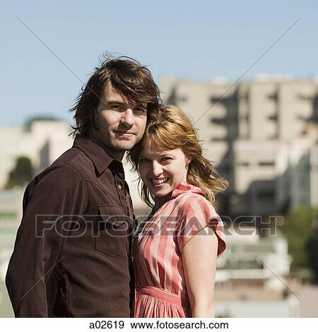 USA, California, San Francisco, young couple standing together and smiling View Large Photo Image Stock Photo - USA, California, San Francisco, young couple standing together and smiling. Fotosearch