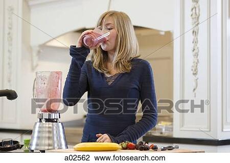 USA, Utah, Alpine, girl (12-13) drinking fruit cocktail from glass View Large Photo Image Stock Image - USA, Utah, Alpine, girl (12-13) drinking fruit cocktail from glass. Fotosearch