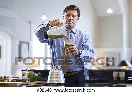 USA, Utah, Alpine, mature man pouring vegetable drink from pitcher to glass View Large Photo Image Stock Image - USA, Utah, Alpine, mature man pouring vegetable drink from pitcher to glass. Fotosearch