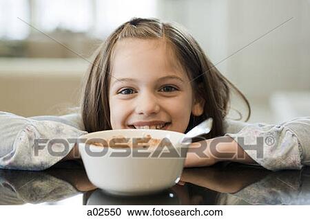 USA, Utah, Alpine, portrait of girl (8-9) smiling with bowl View Large Photo Image Stock Image - USA, Utah, Alpine, portrait of girl (8-9) smiling with bowl. Fotosearch