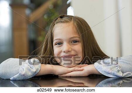 USA, Utah, Alpine, portrait of girl (8-9) smiling View Large Photo Image Stock Photo - USA, Utah, Alpine, portrait of girl (8-9) smiling. Fotosearch