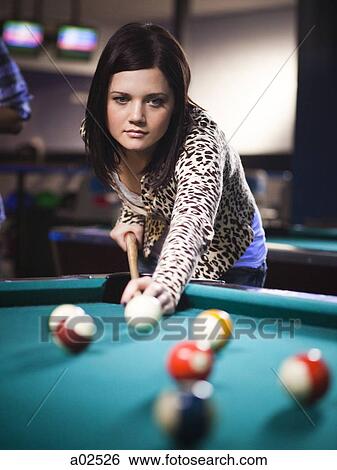 USA, Utah, American Fork, young woman playing pool View Large Photo Image Stock Photograph - USA, Utah, American Fork, young woman playing pool. Fotosearch