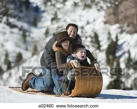 USA, Utah, Big Cottonwood Canyon, parents and son (10-11) tobogganing in mountains View Large Photo Image Stock Image - USA, Utah, Big Cottonwood Canyon, parents and son (10-11) tobogganing in mountains. Fotosearch