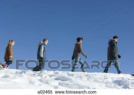USA, Utah, Big Cottonwood Canyon, family walking in snow View Large Photo Image Stock Photography - USA, Utah, Big Cottonwood Canyon, family walking in snow. Fotosearch