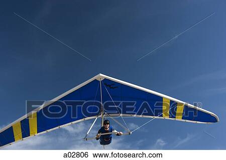 USA, Utah, Lehi, man hang-gliding View Large Photo Image Stock Photograph - USA, Utah, Lehi, man hang-gliding. Fotosearch