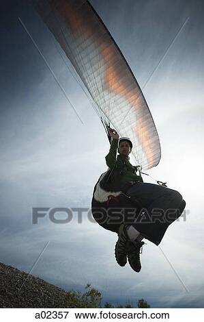 USA, Utah, Lehi, man paragliding View Large Photo Image Stock Photo - USA, Utah, Lehi, man paragliding. Fotosearch