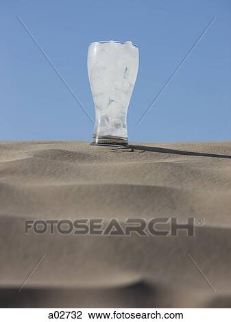 USA, Utah, Little Sahara, glass of ice cold water in desert View Large Photo Image Stock Image - USA, Utah, Little Sahara, glass of ice cold water in desert. Fotosearch