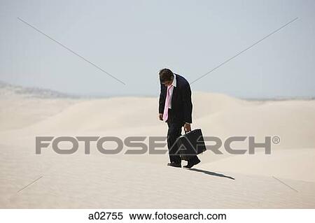 USA, Utah, Little Sahara, mid adult businessman walking on desert View Large Photo Image Stock Photography - USA, Utah, Little Sahara, mid adult businessman walking on desert. Fotosearch
