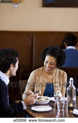 USA, Utah, Orem, couple eating in restaurant View Large Photo Image Stock Photo - USA, Utah, Orem, couple eating in restaurant. Fotosearch