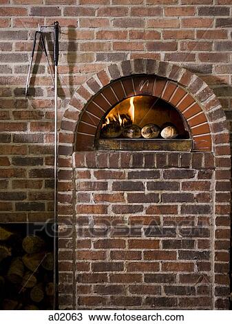 USA, Utah, Orem, logs by brick fireplace View Large Photo Image Stock Image - USA, Utah, Orem, logs by brick fireplace. Fotosearch