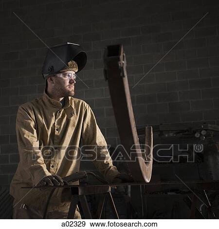 USA, Utah, Orem, male welder in workshop View Large Photo Image Stock Photo - USA, Utah, Orem, male welder in workshop. Fotosearch