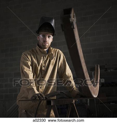 USA, Utah, Orem, portrait of male welder in workshop View Large Photo Image Stock Image - USA, Utah, Orem, portrait of male welder in workshop. Fotosearch