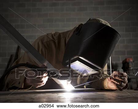 USA, Utah, Orem, welder using torch View Large Photo Image Picture - USA, Utah, Orem, welder using torch. Fotosearch