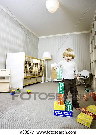 USA, Utah, Provo, Boy (2-3) playing with building blocks View Large Photo Image Stock Photo - USA, Utah, Provo, Boy (2-3) playing with building blocks. Fotosearch
