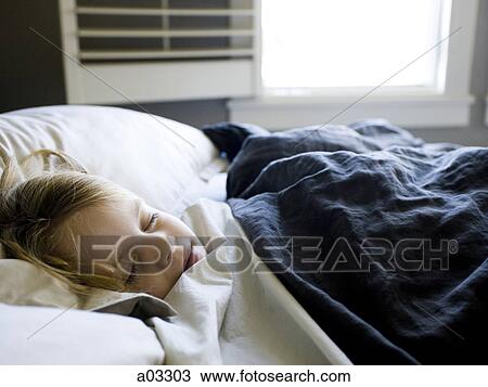 USA, Utah, Provo, Girl (4-5) asleep in bed View Large Photo Image Stock Image - USA, Utah, Provo, Girl (4-5) asleep in bed. Fotosearch