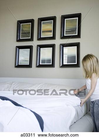 USA, Utah, Provo, Girl (4-5) making bed View Large Photo Image Stock Image - USA, Utah, Provo, Girl (4-5) making bed. Fotosearch