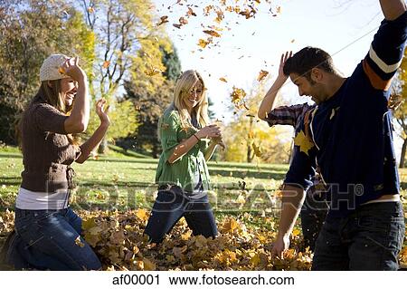USA, Utah, Provo, Group of friends having fun in park View Large Photo Image Stock Image - USA, Utah, Provo, Group of friends having fun in park. Fotosearch