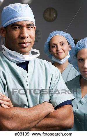 USA, Utah, Provo, portrait of male surgeon and female surgeon smiling View Large Photo Image Stock Photo - USA, Utah, Provo, portrait of male surgeon and female surgeon smiling. Fotosearch