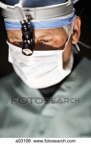 USA, Utah, Provo, portrait of surgeon during operation View Large Photo Image Stock Photograph - USA, Utah, Provo, portrait of surgeon during operation. Fotosearch