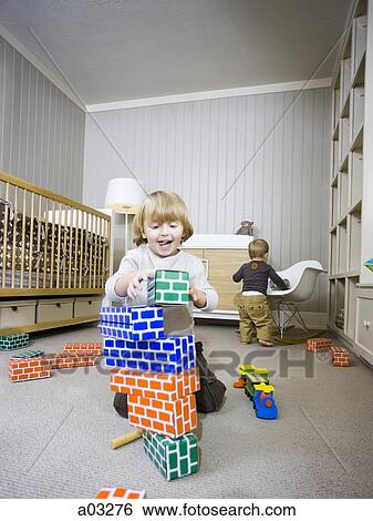 USA, Utah, Provo, Two boys (18-23 months, 2-3) playing with building blocks View Large Photo Image Stock Photograph - USA, Utah, Provo, Two boys (18-23 months, 2-3) playing with building blocks. Fotosearch
