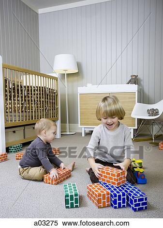 USA, Utah, Provo, Two boys (18-23 months, 2-3) playing with building blocks View Large Photo Image Stock Photography - USA, Utah, Provo, Two boys (18-23 months, 2-3) playing with building blocks. Fotosearch