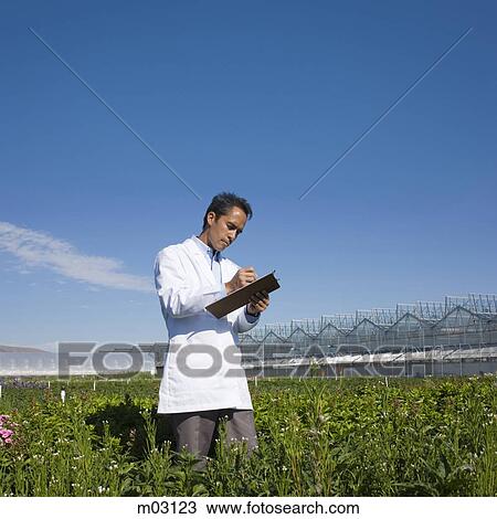 USA, Utah, Salem, Man with clipboard, standing in field View Large Photo Image Stock Image - USA, Utah, Salem, Man with clipboard, standing in field. Fotosearch