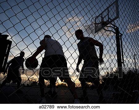 USA, Utah, Salt Lake City, four young men playing street basketball, low angle view View Large Photo Image Stock Photo - USA, Utah, Salt Lake City, four young men playing street basketball, low angle view. Fotosearch