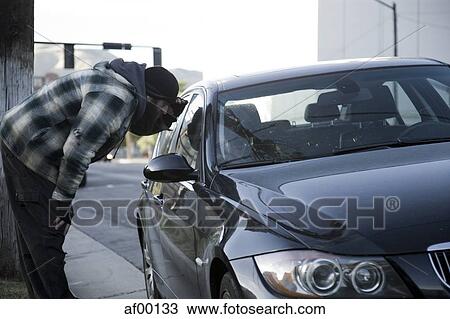 USA, Utah, Salt Lake City, Homeless man peering into car, side view View Large Photo Image Stock Image - USA, Utah, Salt Lake City, Homeless man peering into car, side view. Fotosearch