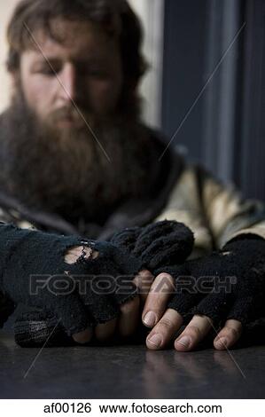 USA, Utah, Salt Lake City, Man in winter clothing, focus on hands in foreground View Large Photo Image Stock Photograph - USA, Utah, Salt Lake City, Man in winter clothing, focus on hands in foreground. Fotosearch