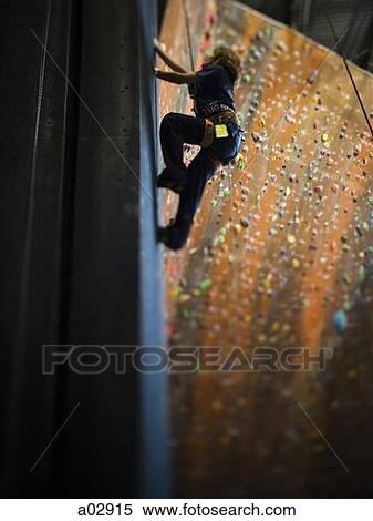 USA, Utah, Sandy, boy climbing in indoor climbing gym, low angle view View Large Photo Image Stock Photography - USA, Utah, Sandy, boy climbing in indoor climbing gym, low angle view. Fotosearch