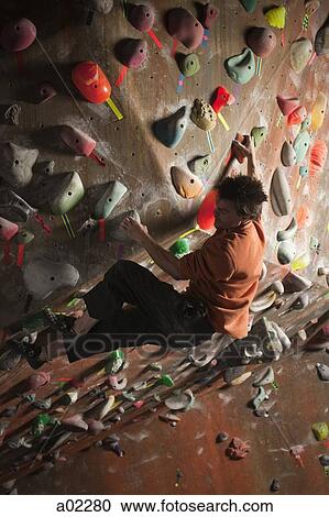 USA, Utah, Sandy, man on indoor climbing wall View Large Photo Image Stock Image - USA, Utah, Sandy, man on indoor climbing wall. Fotosearch