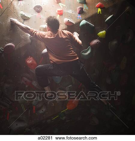 USA, Utah, Sandy, man on indoor climbing wall View Large Photo Image Stock Image - USA, Utah, Sandy, man on indoor climbing wall. Fotosearch