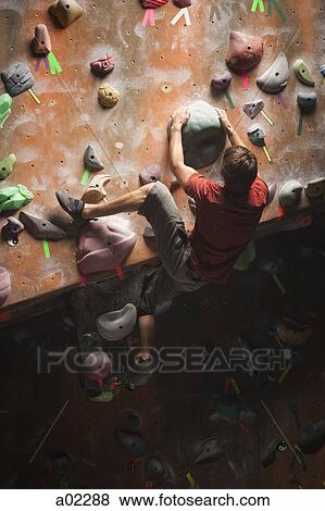 USA, Utah, Sandy, man on indoor climbing wall View Large Photo Image Stock Photo - USA, Utah, Sandy, man on indoor climbing wall. Fotosearch