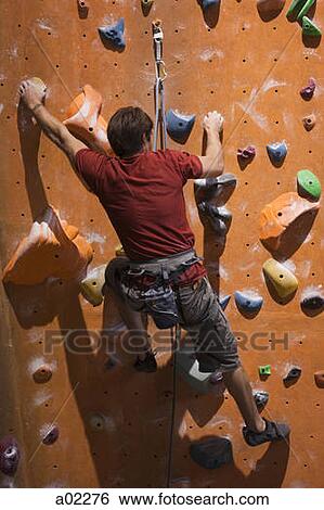 USA, Utah, Sandy, man on indoor climbing wall View Large Photo Image Stock Photograph - USA, Utah, Sandy, man on indoor climbing wall. Fotosearch