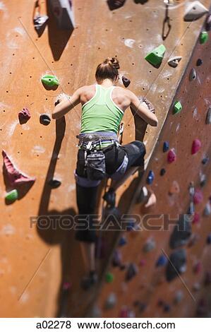 USA, Utah, Sandy, young woman on indoor climbing wall View Large Photo Image Stock Photo - USA, Utah, Sandy, young woman on indoor climbing wall. Fotosearch