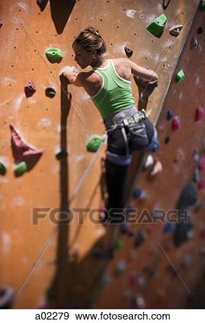 USA, Utah, Sandy, young woman on indoor climbing wall View Large Photo Image Stock Photo - USA, Utah, Sandy, young woman on indoor climbing wall. Fotosearch