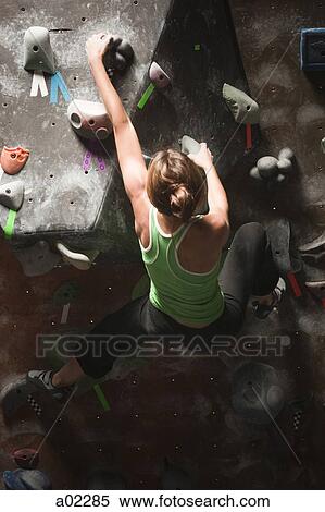 USA, Utah, Sandy, young woman on indoor climbing wall View Large Photo Image Stock Photography - USA, Utah, Sandy, young woman on indoor climbing wall. Fotosearch
